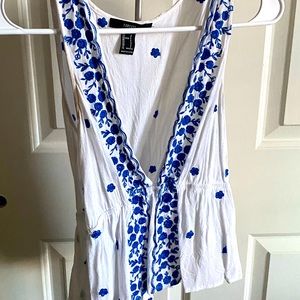 floral tank top with a plunging neckline